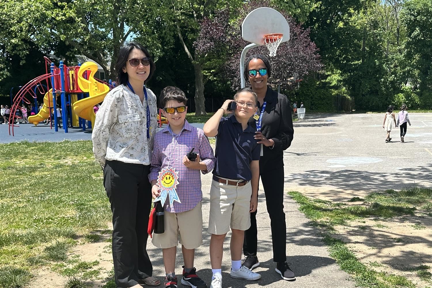  Principal Sherry Ma, students Jacob Klein and Gavin Kroog, AP Jennifer Sheehan. 